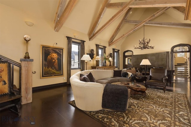 45 Cutthroat Trout, Big Sky, MT 59716 - living area featuring beam ceiling, high vaulted ceiling, baseboards, a chandelier, and wood finished floors