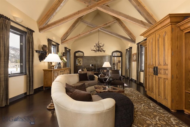 45 Cutthroat Trout, Big Sky, MT 59716 - living room with a chandelier, beamed ceiling, baseboards, and high vaulted ceiling