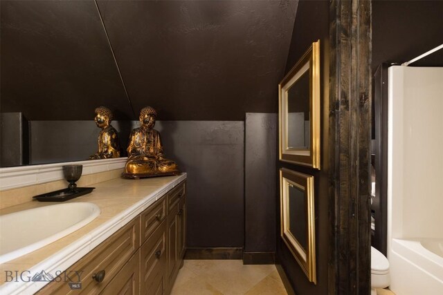 45 Cutthroat Trout, Big Sky, MT 59716 - bathroom with vanity, a tub, toilet, a shower, and tile patterned flooring