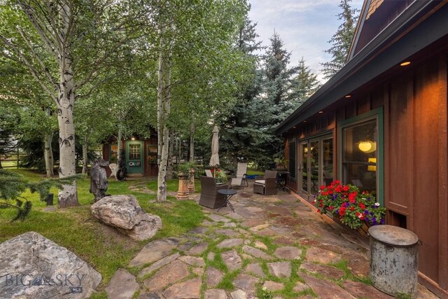 45 Cutthroat Trout, Big Sky, MT 59716 - view of patio featuring french doors