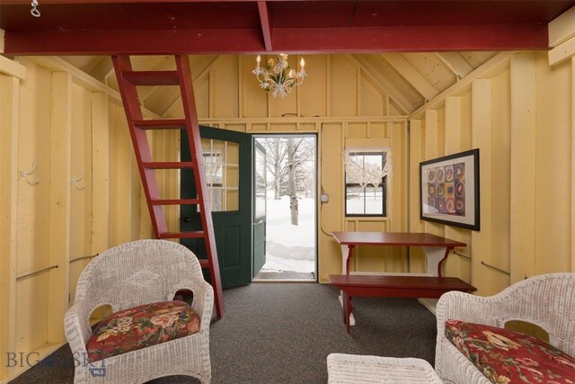 45 Cutthroat Trout, Big Sky, MT 59716 - entryway featuring carpet flooring and a chandelier