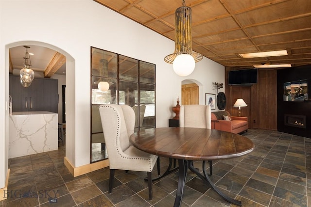 45 Cutthroat Trout, Big Sky, MT 59716 - dining space with arched walkways and stone finish flooring