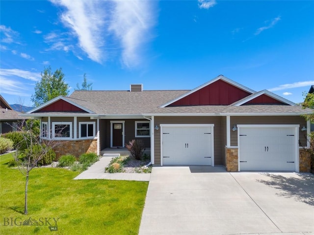 50 Pattee Trl, Bozeman, MT 59718 - craftsman house with stone siding, an attached garage, concrete driveway, and board and batten siding