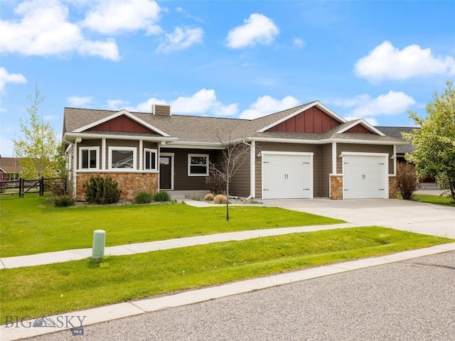 50 Pattee Trl, Bozeman, MT 59718 - craftsman-style home featuring a garage, board and batten siding, driveway, stone siding, and roof with shingles