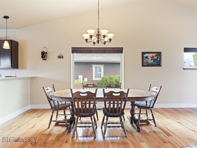 50 Pattee Trl, Bozeman, MT 59718 - dining room featuring a chandelier, light wood finished floors, and baseboards