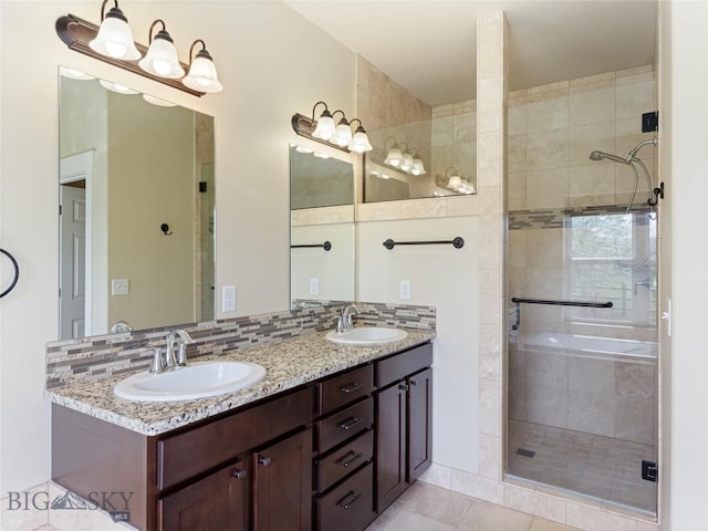 50 Pattee Trl, Bozeman, MT 59718 - bathroom featuring a shower stall, double vanity, and tile patterned floors