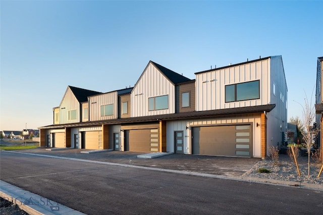1745 Windward Ave Unit A, Bozeman, MT 59718 - multi unit property with board and batten siding and an attached garage