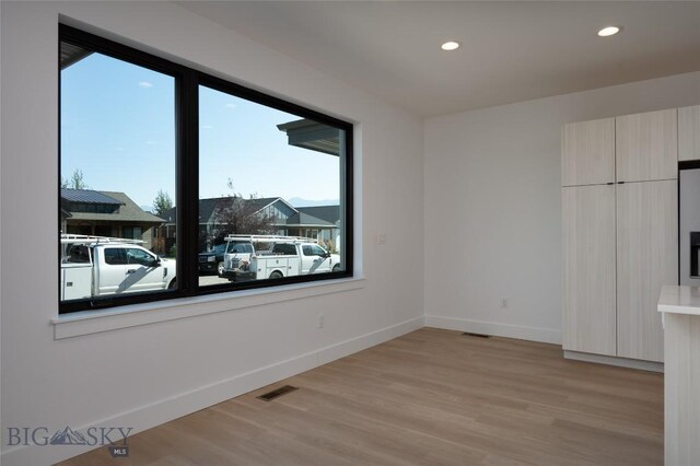 1745 Windward Ave Unit A, Bozeman, MT 59718 - empty room with baseboards, light wood-style flooring, and recessed lighting