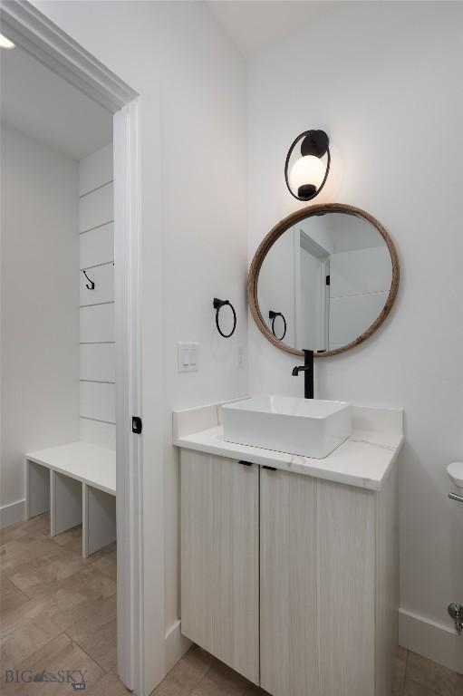 1745 Windward Ave Unit A, Bozeman, MT 59718 - bathroom with vanity, baseboards, and toilet
