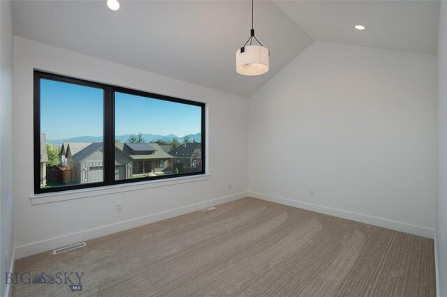 1745 Windward Ave Unit A, Bozeman, MT 59718 - unfurnished room with vaulted ceiling, baseboards, and recessed lighting