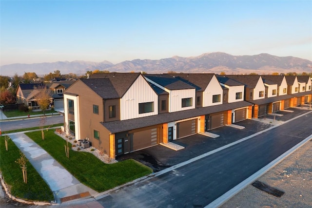 1745 Windward Ave Unit C, Bozeman, MT 59718 - view of front facade featuring board and batten siding, a residential view, and a mountain view