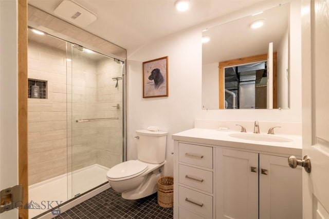 411 W Railroad Ave N, Manhattan, MT 59741 - bathroom with toilet, vanity, a stall shower, tile patterned floors, and recessed lighting