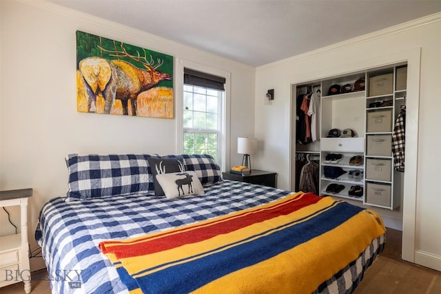 411 W Railroad Ave N, Manhattan, MT 59741 - bedroom with ornamental molding, wood finished floors, and a closet