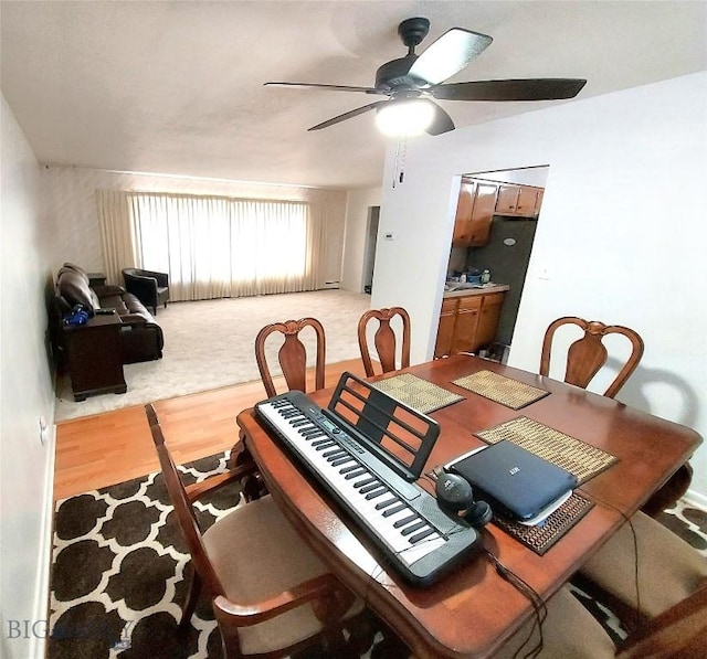 2040 Adams, Butte, MT 59701 - dining room featuring a ceiling fan and wood finished floors