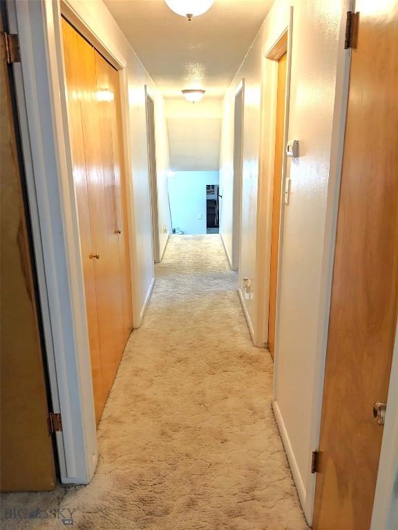 2040 Adams, Butte, MT 59701 - hall with light colored carpet