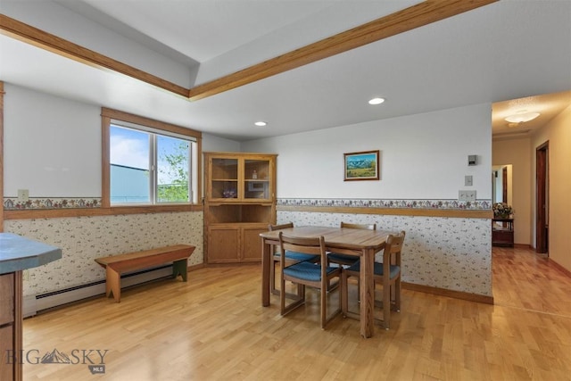 1385 Baldy Mountain Ln, Belgrade, MT 59714 - dining area with a baseboard radiator, light wood-style floors, recessed lighting, and wainscoting