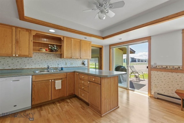 1385 Baldy Mountain Ln, Belgrade, MT 59714 - kitchen featuring white dishwasher, a baseboard heating unit, healthy amount of natural light, and a sink