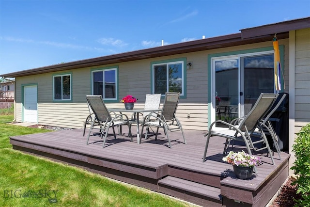 1385 Baldy Mountain Ln, Belgrade, MT 59714 - wooden terrace with outdoor dining space