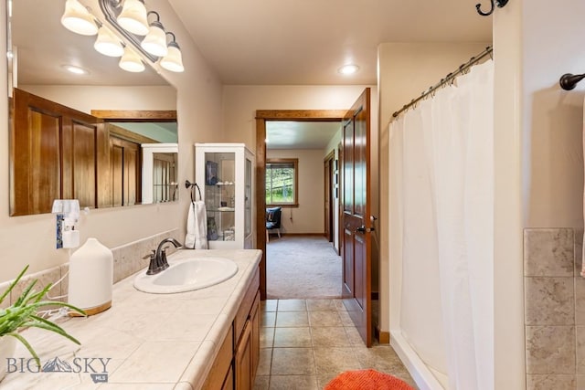 2224 Sourdough Rd, Bozeman, MT 59715 - full bathroom with vanity and tile patterned floors