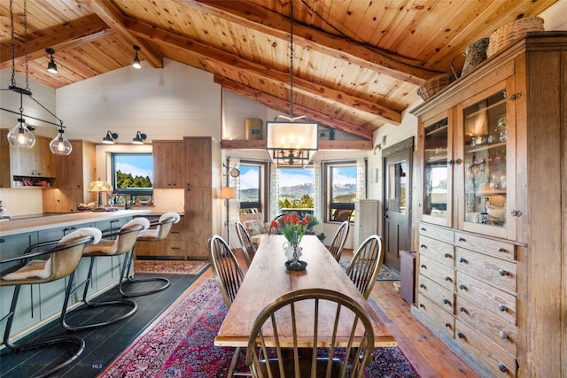 125 Rocky Mountain Mdws, Bozeman, MT 59715 - dining area with hardwood / wood-style floors, wood ceiling, wood walls, and a chandelier