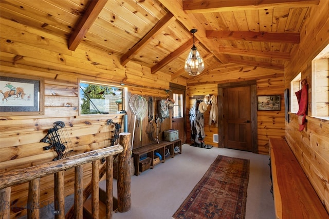125 Rocky Mountain Mdws, Bozeman, MT 59715 - mudroom featuring wooden walls, wooden ceiling, and carpet flooring