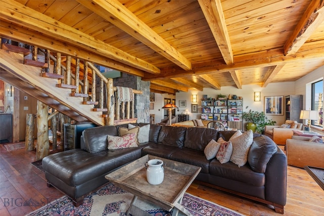 125 Rocky Mountain Mdws, Bozeman, MT 59715 - living room with hardwood / wood-style flooring, wooden ceiling with exposed beams, and stairway