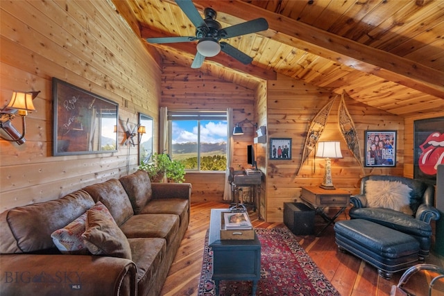 125 Rocky Mountain Mdws, Bozeman, MT 59715 - living room featuring hardwood / wood-style flooring, wooden walls, a ceiling fan, and wood ceiling