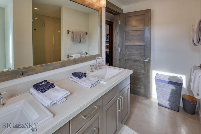 102 Outlook Trl, Big Sky, MT 59716 - bathroom featuring double vanity, tile patterned flooring, and a stall shower