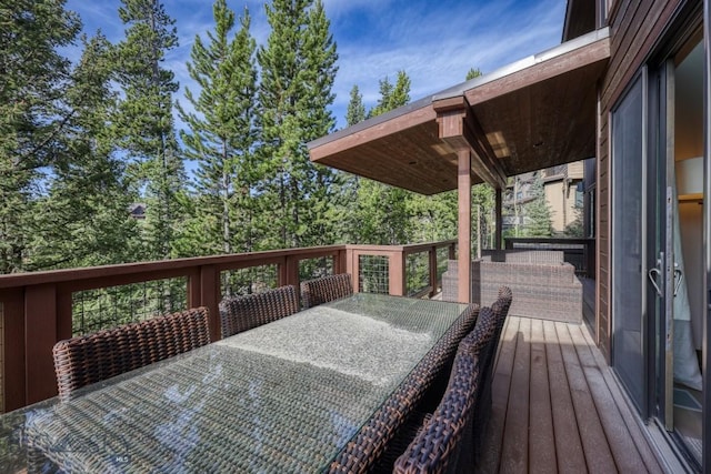 102 Outlook Trl, Big Sky, MT 59716 - wooden deck featuring outdoor dining space