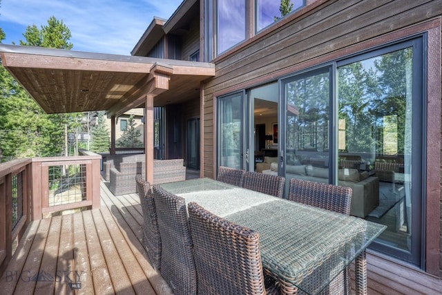 102 Outlook Trl, Big Sky, MT 59716 - wooden deck featuring outdoor dining area