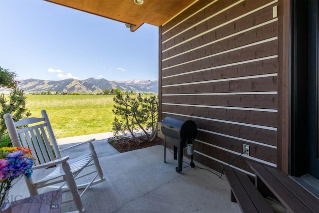 306 Glenbrook Ln, Belgrade, MT 59714 - view of patio / terrace with a rural view and a mountain view