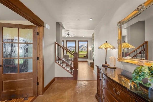306 Glenbrook Ln, Belgrade, MT 59714 - foyer entrance with stairs, ceiling fan, baseboards, recessed lighting, and concrete floors