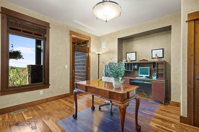 306 Glenbrook Ln, Belgrade, MT 59714 - office featuring wood finished floors and baseboards