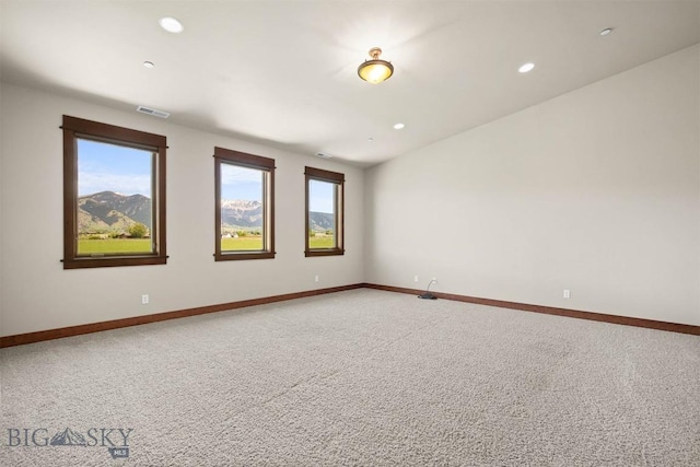 306 Glenbrook Ln, Belgrade, MT 59714 - spare room with light colored carpet, recessed lighting, and baseboards