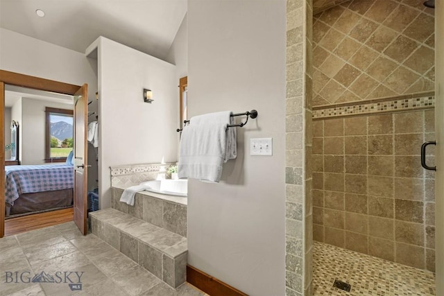 306 Glenbrook Ln, Belgrade, MT 59714 - ensuite bathroom featuring a garden tub and tiled shower
