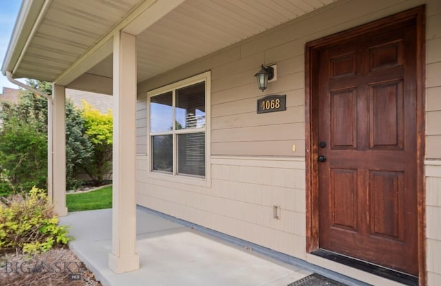 4068 Opal St, Bozeman, MT 59718 - doorway to property with covered porch