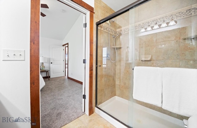 4068 Opal St, Bozeman, MT 59718 - full bathroom featuring a stall shower, lofted ceiling, ceiling fan, baseboards, and tile patterned flooring