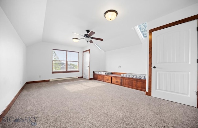 4068 Opal St, Bozeman, MT 59718 - bonus room with baseboard heating, a ceiling fan, carpet flooring, vaulted ceiling, and baseboards