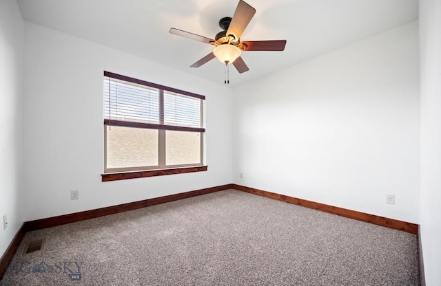 4068 Opal St, Bozeman, MT 59718 - unfurnished room with carpet, baseboards, and ceiling fan