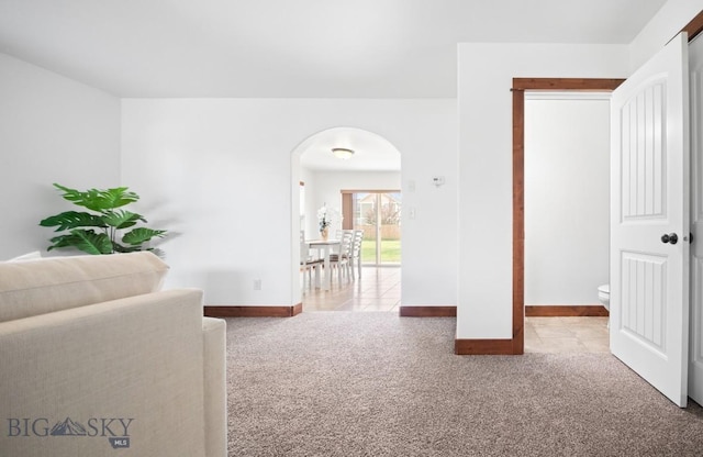 4068 Opal St, Bozeman, MT 59718 - hallway featuring arched walkways, carpet flooring, and baseboards