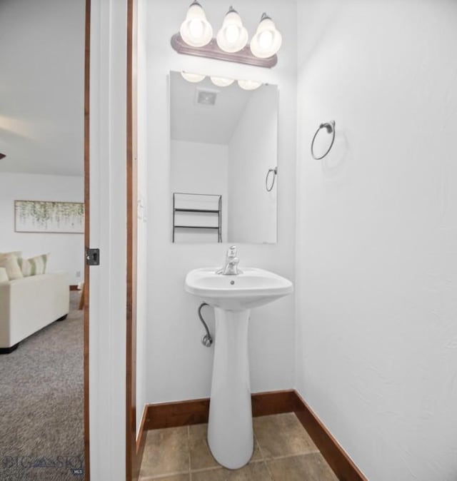 4068 Opal St, Bozeman, MT 59718 - bathroom featuring baseboards