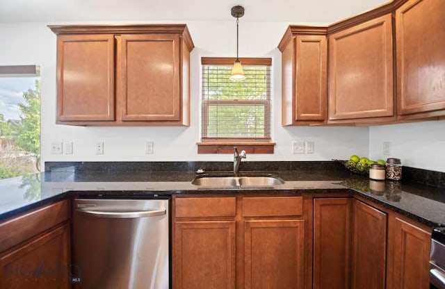 4068 Opal St, Bozeman, MT 59718 - kitchen featuring stainless steel dishwasher, a sink, dark stone countertops, and brown cabinets