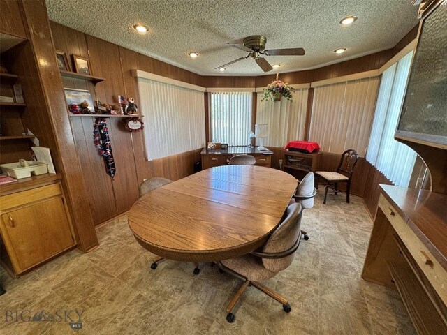 2301 Banks Ave, Butte, MT 59701 - dining room with wooden walls, ceiling fan, a textured ceiling, light flooring, and recessed lighting