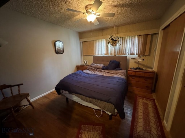 2301 Banks Ave, Butte, MT 59701 - bedroom with wood finished floors, baseboards, a ceiling fan, and a textured ceiling