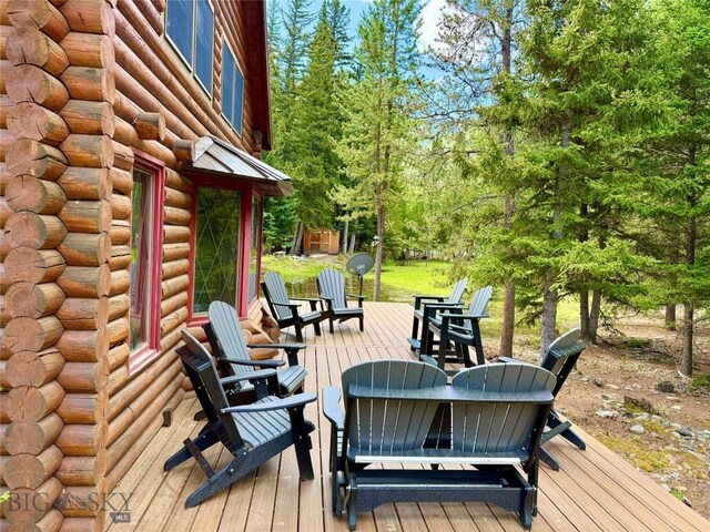 14 Ken Dan, Mcleod, MT 59052 - wooden terrace with an outdoor fire pit
