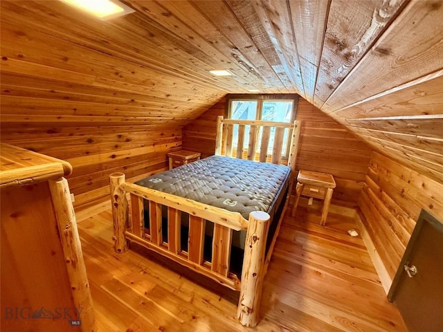 14 Ken Dan, Mcleod, MT 59052 - bedroom with wood ceiling, wood walls, wood-type flooring, and lofted ceiling