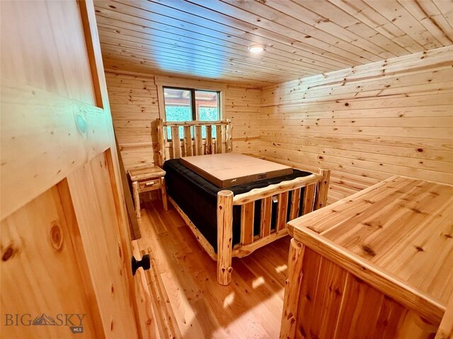 14 Ken Dan, Mcleod, MT 59052 - bedroom with wooden ceiling, wood walls, and light wood-style floors