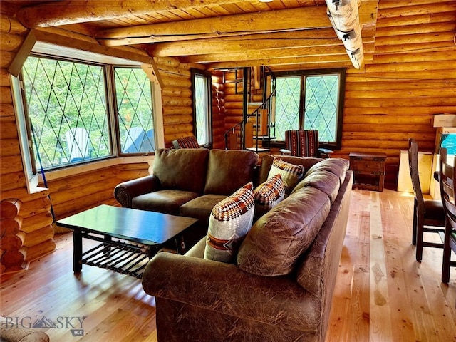 14 Ken Dan, Mcleod, MT 59052 - living area with wood-type flooring, log walls, and wooden ceiling with exposed beams