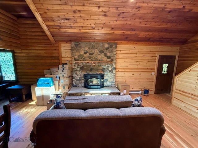 14 Ken Dan, Mcleod, MT 59052 - living room with wood ceiling, vaulted ceiling, light wood finished floors, a wood stove, and rustic walls