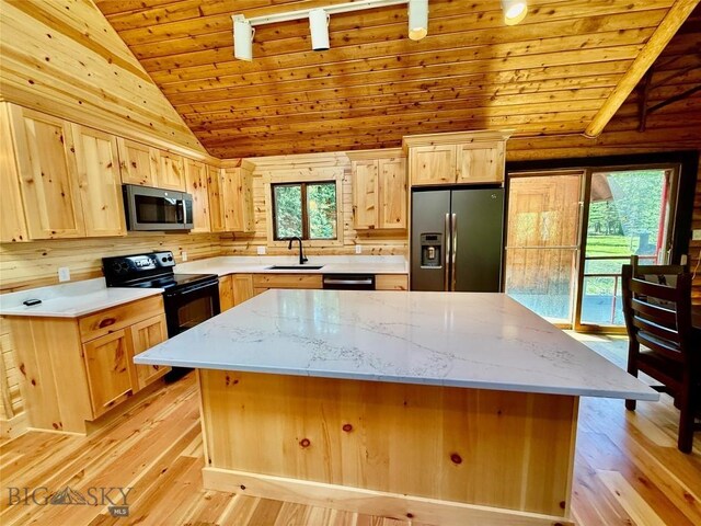 14 Ken Dan, Mcleod, MT 59052 - kitchen with appliances with stainless steel finishes, light brown cabinetry, wooden ceiling, a sink, and light wood-style floors